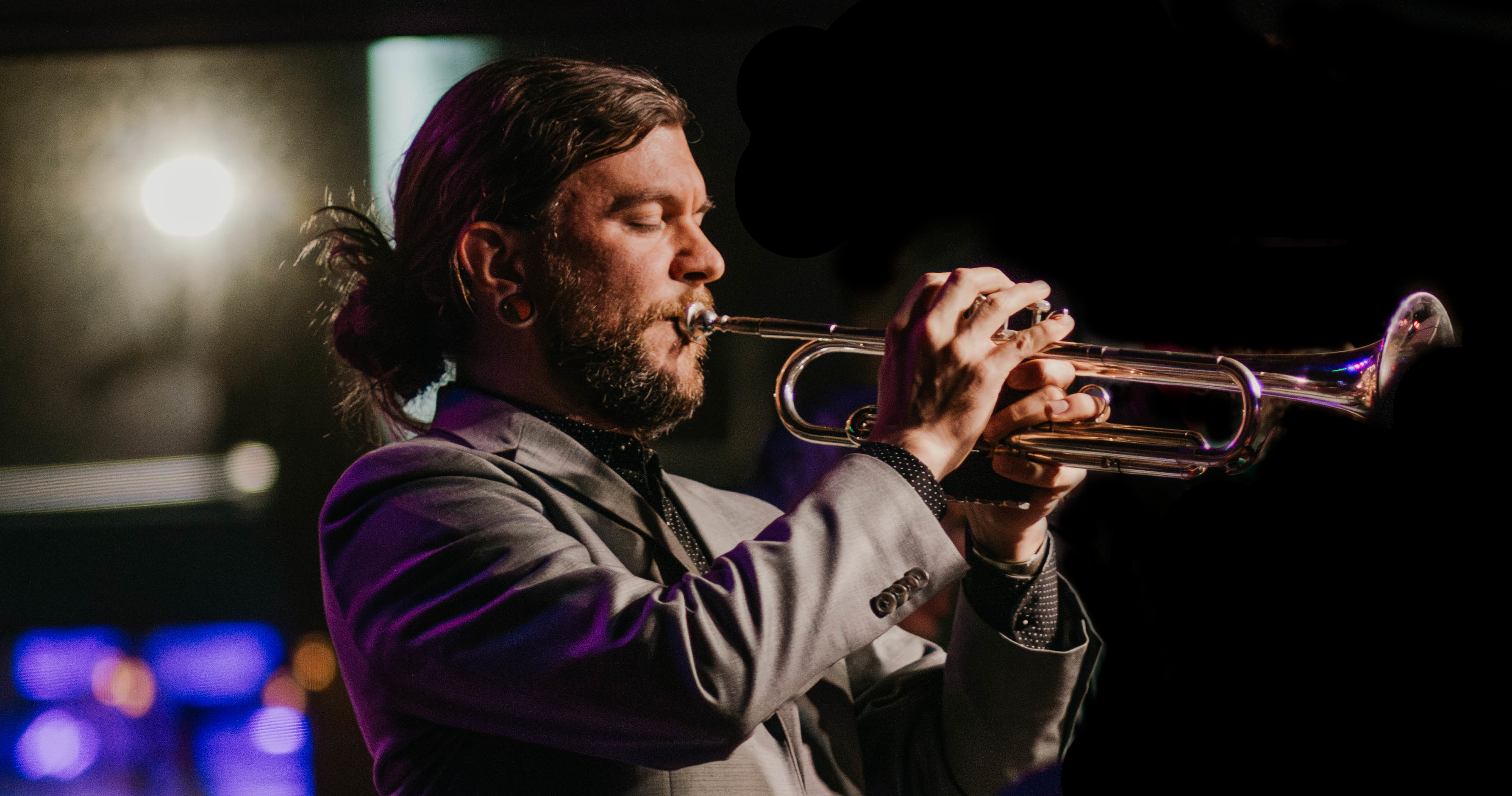 Image of Justin Klava performing trumpet